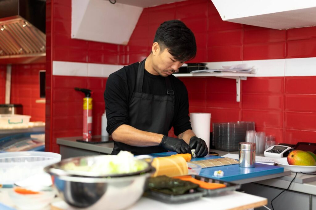 chef prepping sushi