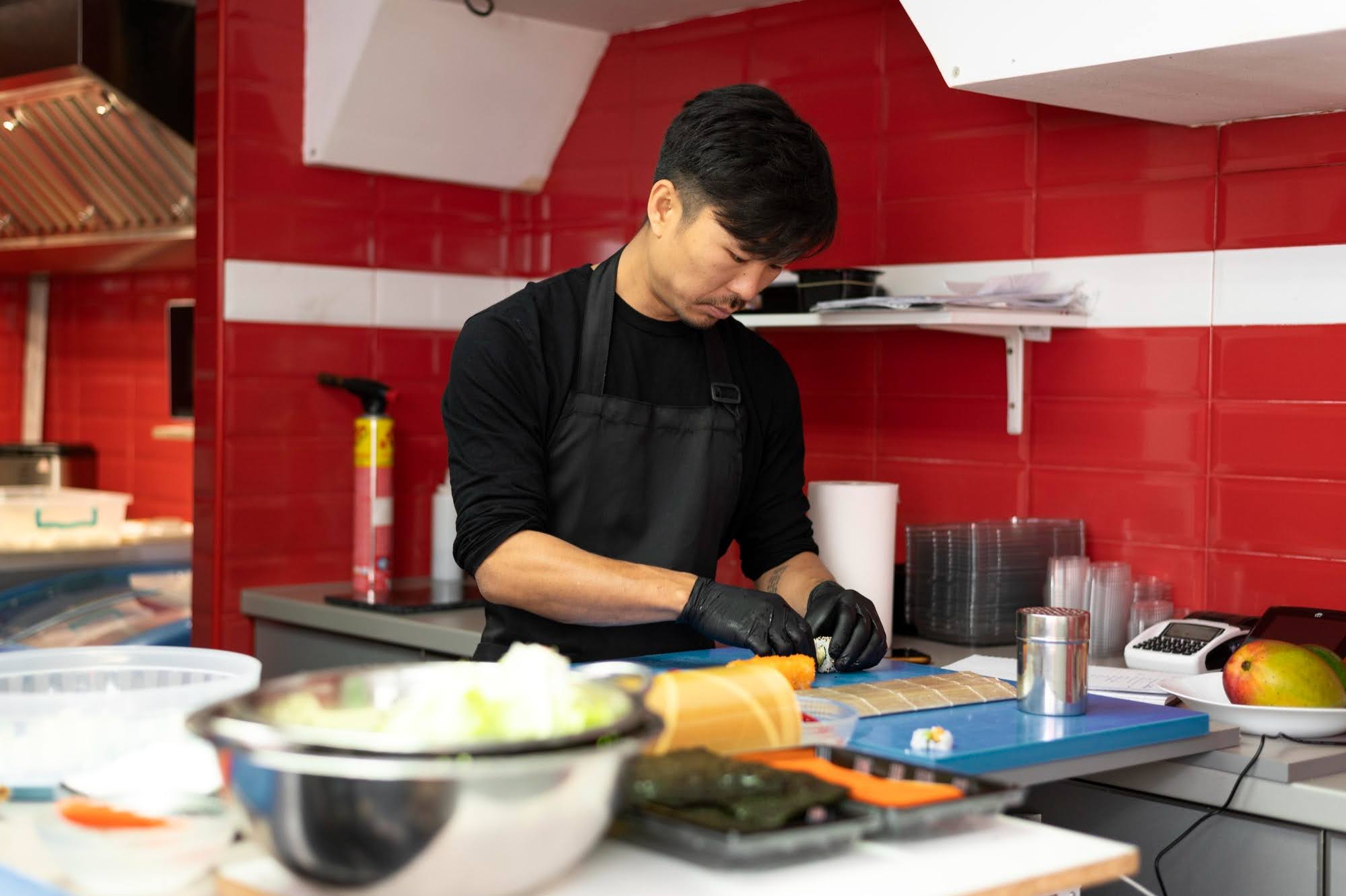 chef prepping sushi