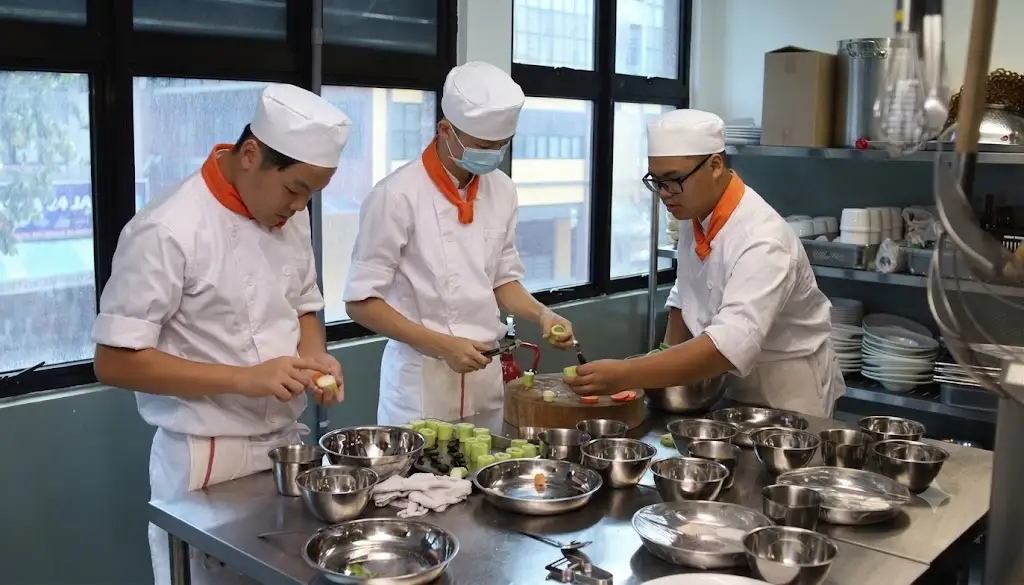 couple of chefs prepping food