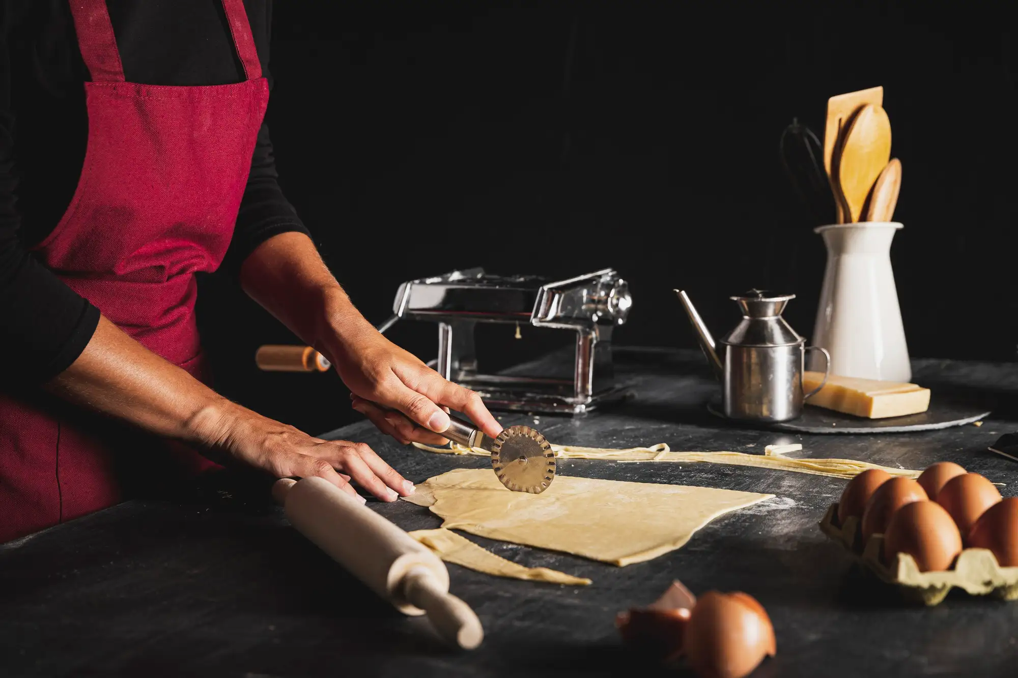 chef slicing dough